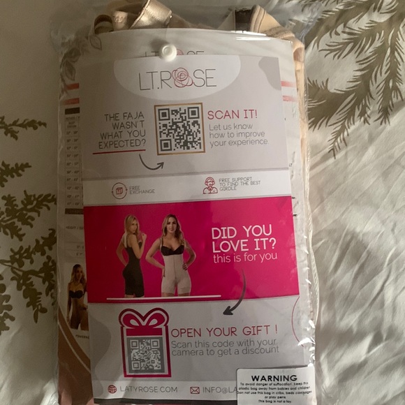 Never worn. Waist shaping body suit. - Picture 1 of 2